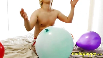 Elix Ataxx rubs the balloon over his body while rubbing dick around his playmates