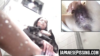 Hairy pussy babe caught touching herself in public restroom