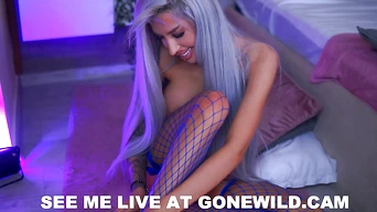 Sexy Tattooed Blonde with Big Tits Teases Ass and Pussy in Fishnets